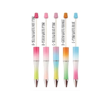 May include: Five ombre pens with different color combinations. The pens have a silver top and a silver tip. The colors are yellow, peach, blue, green, and pink.