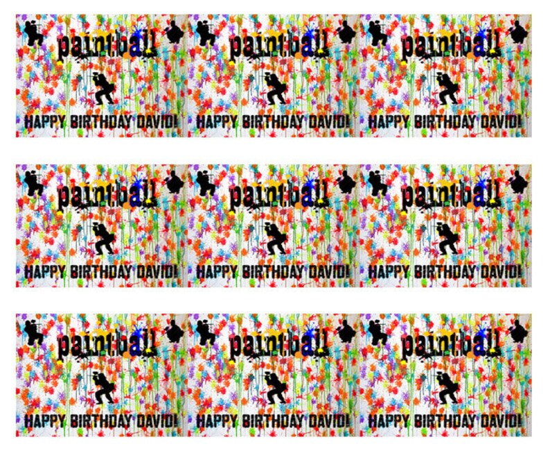 May include: Three rows of colorful edible cake toppers with a paintball theme. Each row features the word "paintball" in black text with a silhouette of a person holding a paintball gun. The text "Happy Birthday David!" is printed below each row.