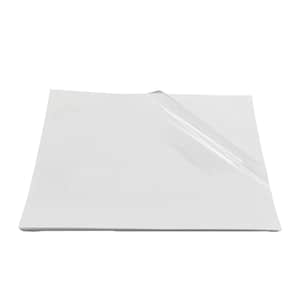May include: A white sheet of paper with a clear plastic sheet on top of it.