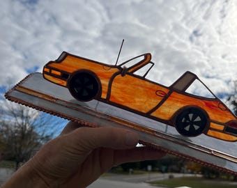 Vehículo personalizado con vitrales VISTA LATERAL