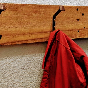 Railroad spike coat rack