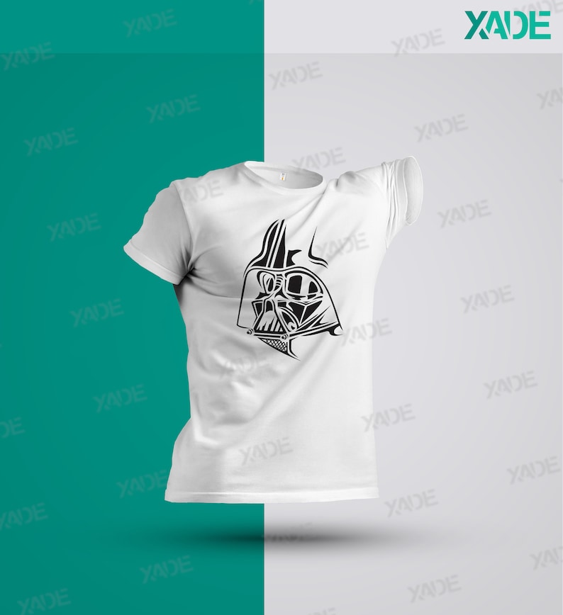 May include: A white t-shirt with a black graphic of Darth Vader's face on the front.