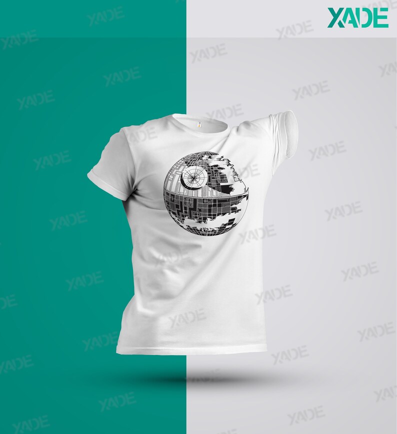 K&ouml;nnte beinhalten: Wei&szlig;es T-Shirt mit einem schwarz-wei&szlig;en Motiv des Todessterns aus Star Wars.