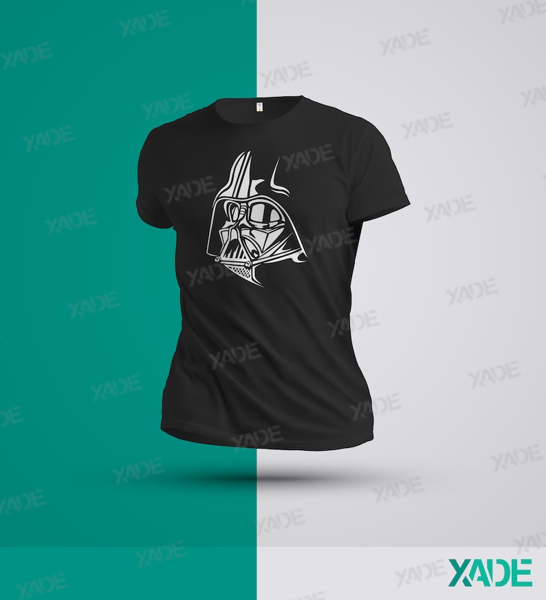 May include: Black t-shirt with a white graphic of Darth Vader's face.