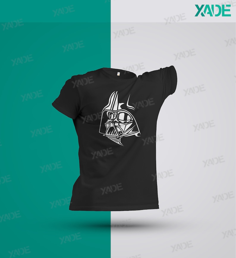 May include: Black t-shirt with a white graphic of Darth Vader's face.