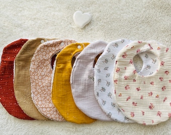 Weekly set of bibs in double floral cotton gauze and beige and mustard organic sponge