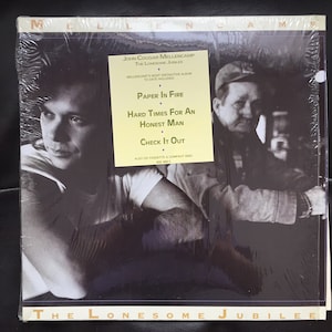 Vintage John Cougar Mellencamp The Lonesome Jubillee album still has original plastic image 1