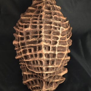 Cocoon, ceramic mask, sculpture
