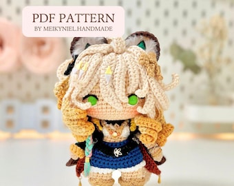 May include: Crocheted amigurumi doll with blonde hair, green eyes, and a blue and white dress. The doll is wearing a brown and gold vest and has a brown and gold headband. The doll is standing on a white surface. PDF PATTERN BY MEIKYNIEL.HANDMADE