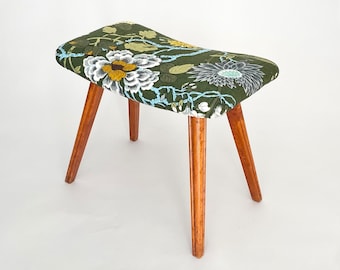 A mid century modern upholstered stool. Swedish, Scandinavian. 50s 60s