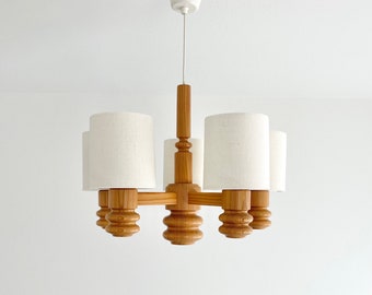 Swedish turned pine wood chandeliere from the 70s. Scandinavian mid century modern.