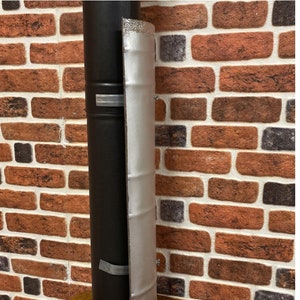 Heat cut off for stovepipe, insulation for stovepipe, stovepipe and wood wall separator