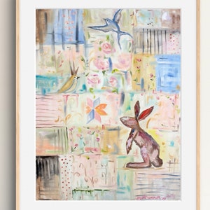 May include: A colorful abstract painting with a patchwork design featuring a blue bird, a small bird with a crown, and a brown rabbit. The painting is set against a background of pink, blue, and yellow hues.