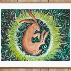 May include: A painting of a brown rabbit curled up in a circle of green and yellow leaves. The background is a dark green with swirling patterns.