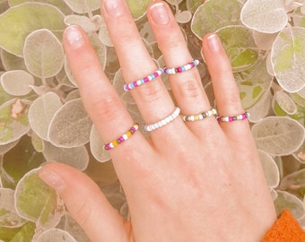 Pride rings/ pride flag rings/ seed bead rings/ pride beaded rings/ pride gifts/ pride/ flag rings/ pride jewellery/ jewellery gifts.