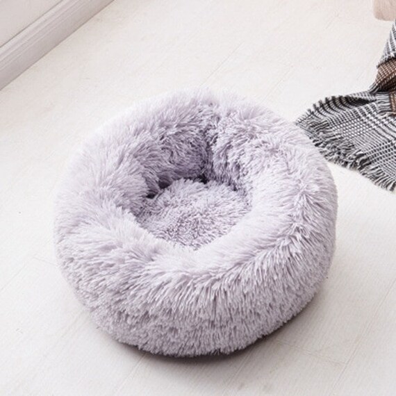 gray fluffy dog bed