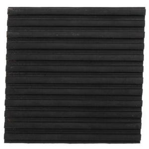 May include: A square, black rubber mat with a ridged surface. The ridges run horizontally across the mat, creating a textured pattern. The mat appears to be made of a durable material.