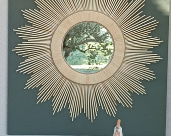 Miroir rond en bois naturel raphia et cordes pour un intérieur tendance chic et bohème