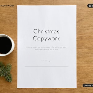 May include: A white paper document titled Christmas Copywork with 47 pages, featuring text about Dickens, carols, and winter poems for adults and teens in cursive and print, accompanied by a white mug of black coffee and a small green pine sprig.