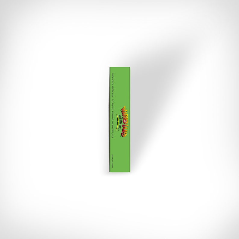 May include: Green game cartridge with the text "Taro Land" and "Super Famicom" in yellow and red letters.