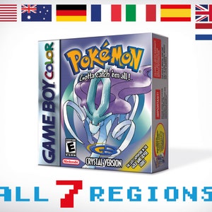 以下が含まれることがあります： ポケモンクリスタルバージョン用のゲームボーイカラーゲームカートリッジ。ボックスアートには、青と紫のポケモンが描かれており、「Gotta catch 'em all!」「Crystal Version」の文字が書かれています。