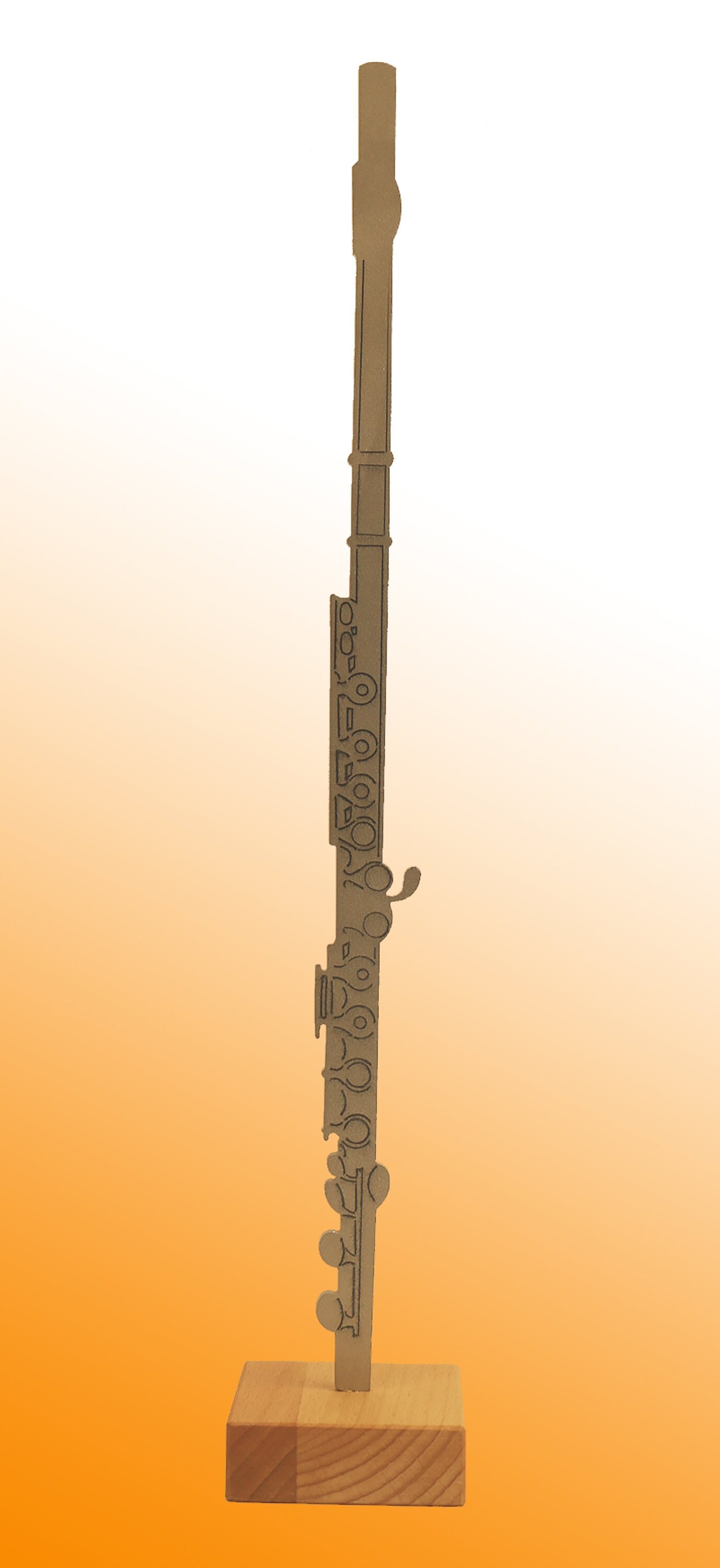 Transverse flute made of stainless steel on wooden base
