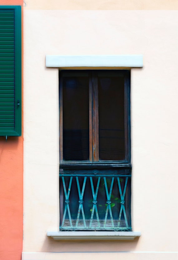 Window and shutters in Bologna, Italy.