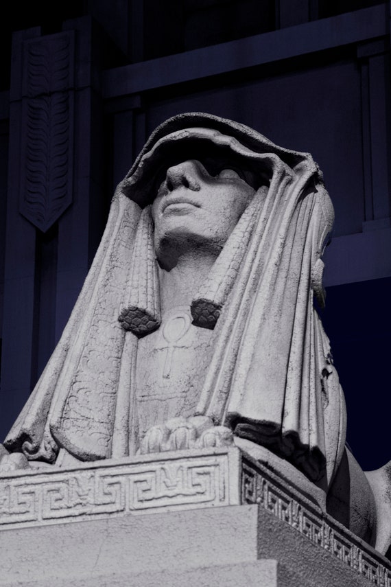 A sphinx figure guards the entrance to a Scottish Mason temple, US.