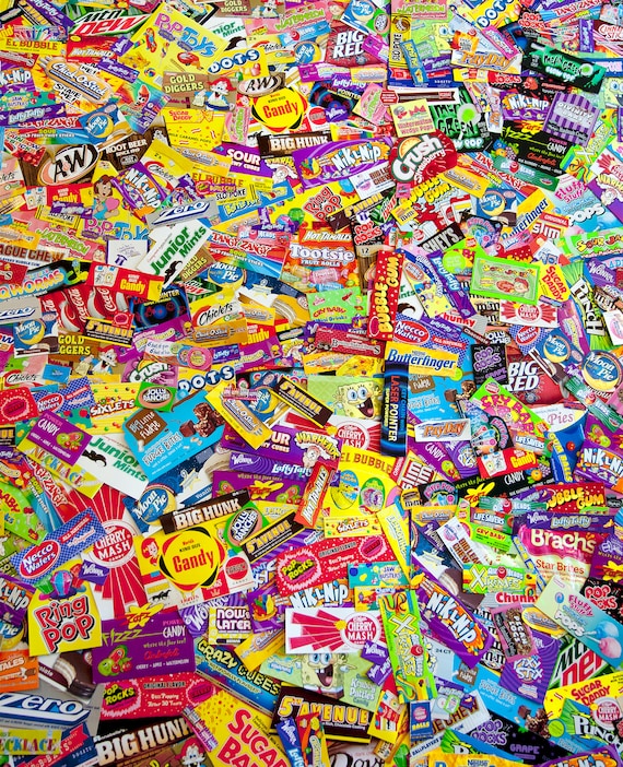 Photo print of big pile of colorful US candy wrappers.