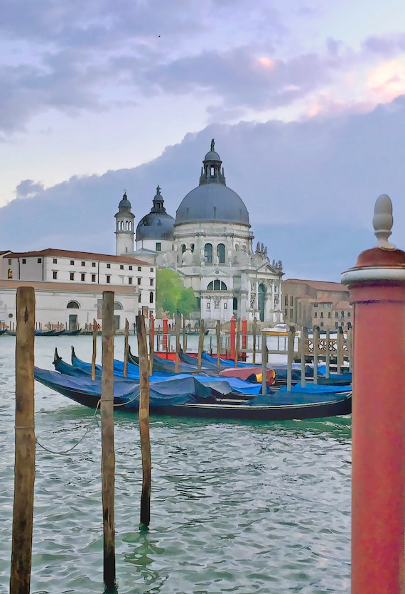 Gondolas moored in the Venice Grand Canal at sunset, Venice, 2017.