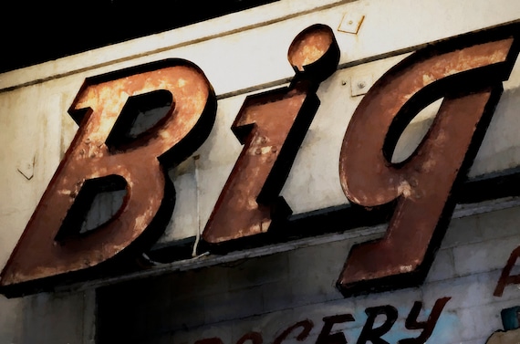 Rusted outdoor business sign on wall, Big.