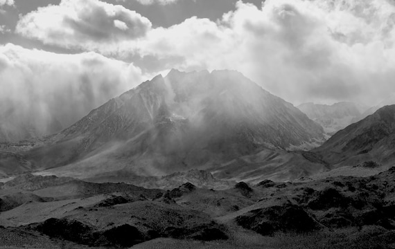 Rain, clouds, and mist over Buttermilk Mountain, CA.