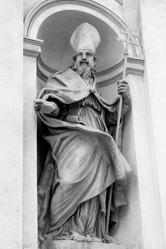Statue of a scary Pope at St. Peter's cathedral plaza, Vatican, Rome.