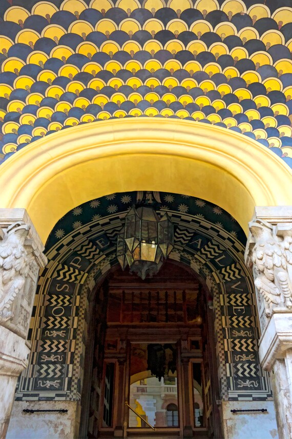 Arch entrance to Gino Coppede building, Rome.