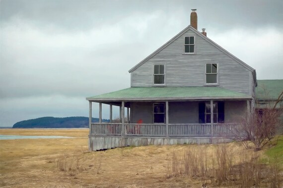 Lonely house on salt marsh near Gloucester, Mass.