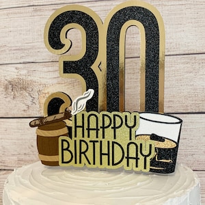 May include: Black and gold glitter cake topper with the number 30, the words "Happy Birthday", a barrel with a cigar, and a glass of whiskey.