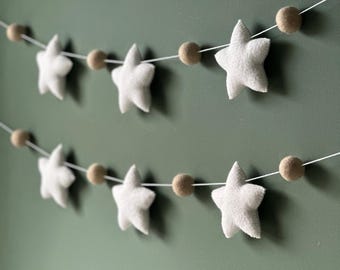 Felt Star Garland: Handmade Nursery Decor with Pom Poms