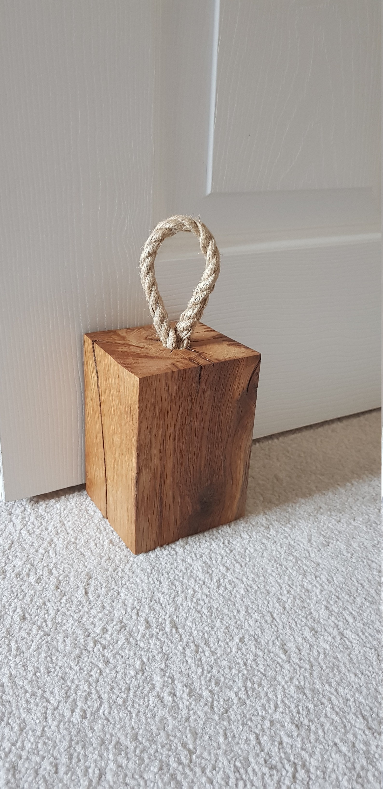 Handmade solid oak doorstop weight with jute rope handle Etsy