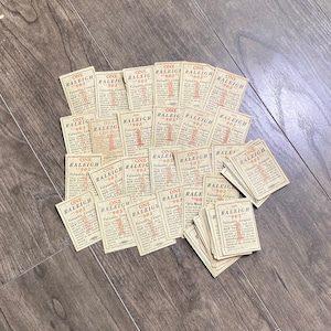 LOTES DE 5) Cupones de cigarrillos Raleigh antiguos. Artículos de papel para efímeras y scrapbooking. Lote de revistas basura, manualidades. Certificados de acciones. Lote de antigüedades.