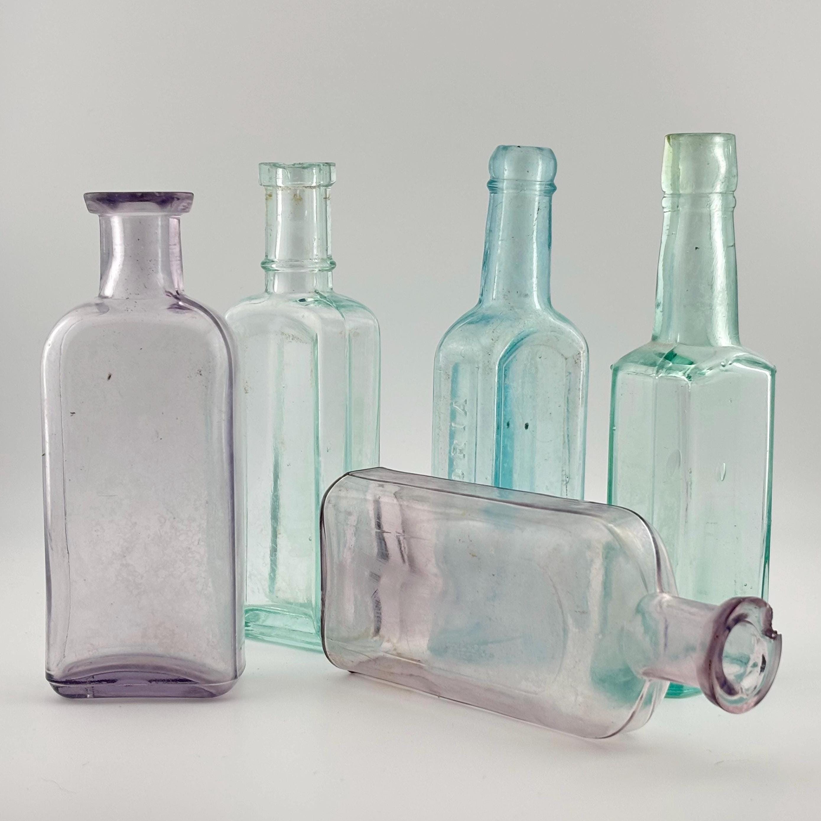 アンティークマンガンガラス瓶：サンパープル＆アクア、1915年以前の