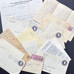 May include: A selection of antique letters and envelopes, with stamps and postmarks. The documents are in various sizes and shades of cream and tan, with handwritten text visible. Some envelopes have the text "The Texas Company".