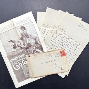 May include: A collection of vintage paper ephemera including a Chicago Opera Association advertisement featuring a person on a donkey, several handwritten letters dated December 19, 1915, and a stamped envelope addressed to Mrs. Elizabeth Funk in Brooklyn, NY.