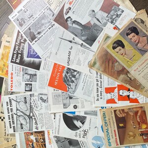 May include: A collection of vintage advertisements and ephemera, featuring various products and services. The papers display a range of colors, with text and illustrations. The ads include text such as "Schenley O.F.C.", "Crystal Gel", and "Go Electric".