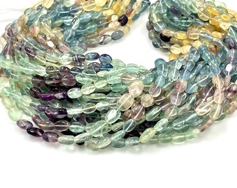 Designer exclusive unique jewelry. Beryl AAA beads elastic bracelet with silk tassel and heart matte bead