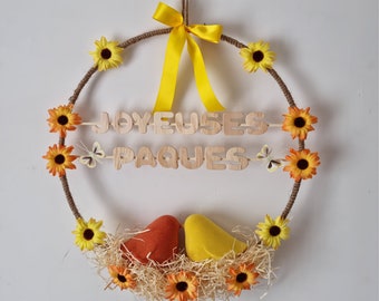 Flower rope circle decorated with daisy birds and an inscription Happy Easter for Easter "HAPPY EASTER"