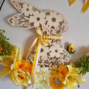 Black metal circle decorated for Easter with a wooden rabbit, a lotus, lilies, roses and greenery VIVE LE PRINTEMPS image 10