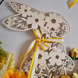 Black metal circle decorated for Easter with a wooden rabbit, a lotus, lilies, roses and greenery VIVE LE PRINTEMPS image 9