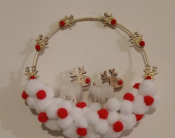 Circle decorated in gold metal pompoms white red and small reindeer "PETIT RENNE"