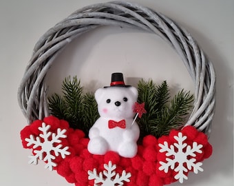 Crown in gray wicker decorated red tassel bear and fir branch "NOUNOURS LAND"