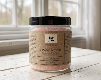 Sales de baño espumosas de cereza y almendra - 227 g. Un baño relajante para mimarte y cuidarte.